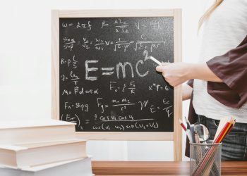 E-mc2 written on chalkboard