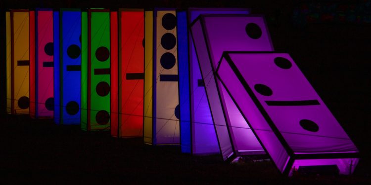 a row of brightly colored boxes sitting next to each other