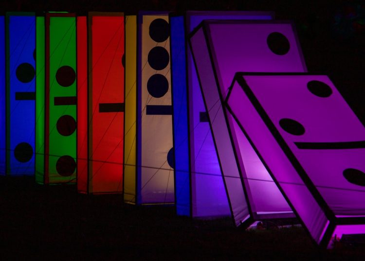 a row of brightly colored boxes sitting next to each other