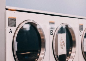 a row of washers sitting next to each other