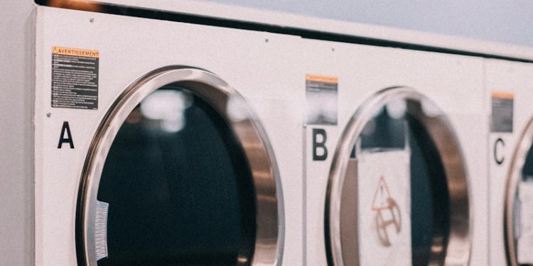 a row of washers sitting next to each other