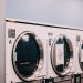 a row of washers sitting next to each other