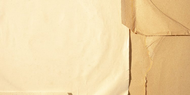 white printer paper on brown textile