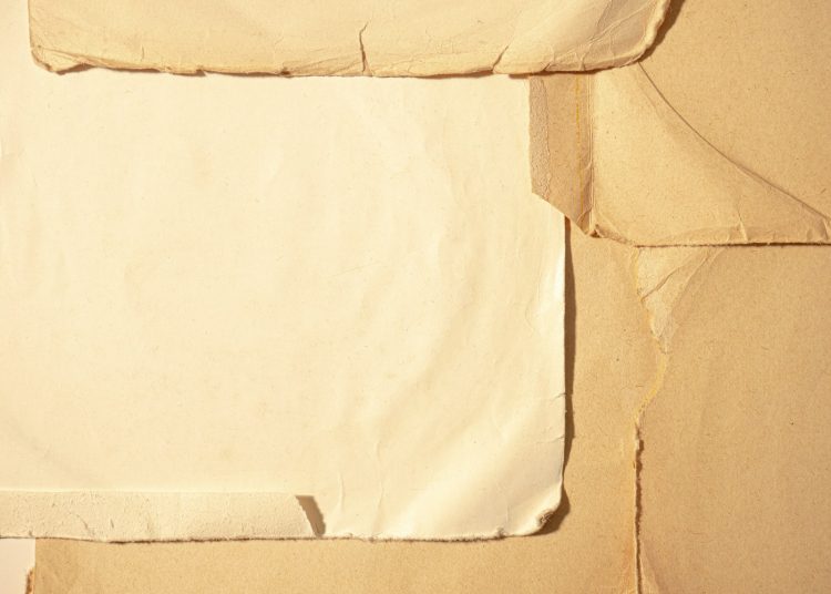 white printer paper on brown textile