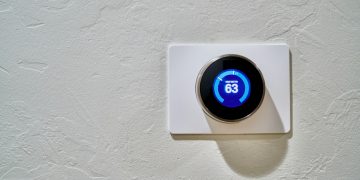 white thermostat at 62