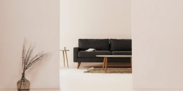 black and brown leather padded tub sofa