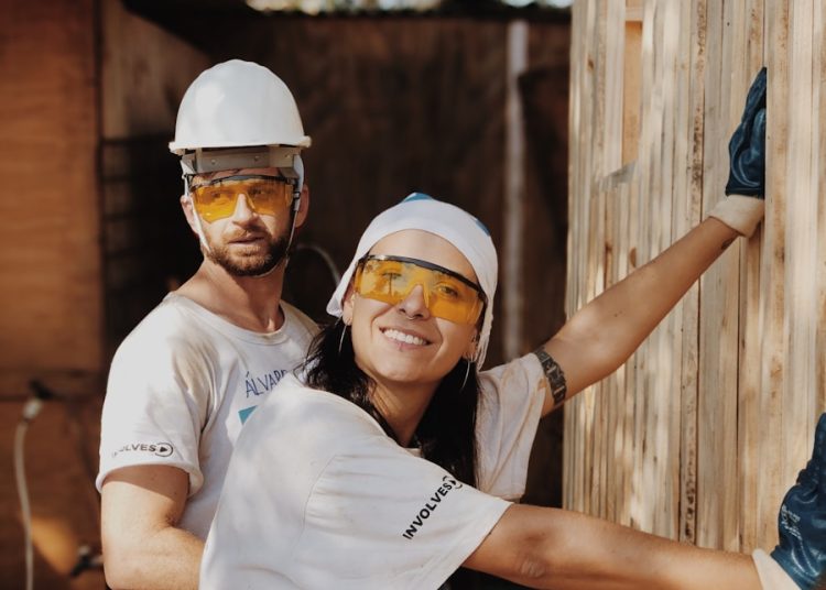 woman in white shirt wearing white helmet