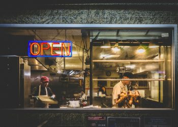 person standing in kitchen during nighttime