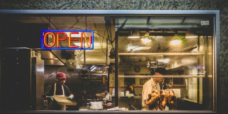 person standing in kitchen during nighttime