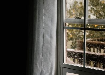 water dew on clear glass sliding window during daytime