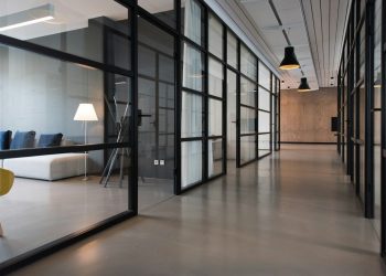 hallway between glass-panel doors